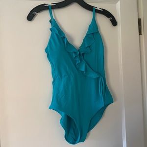 Turquoise becca one peice ruffle size snall